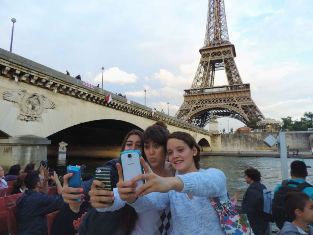 School trips to Paris - students on the River Seine